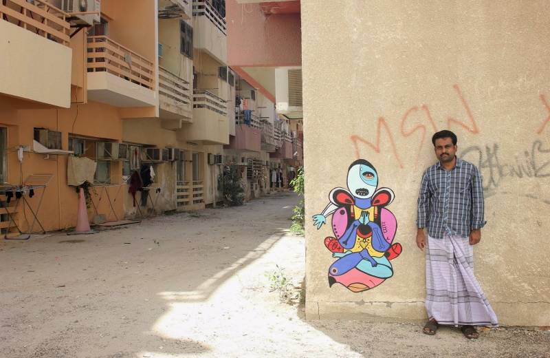 Maľba na schátranej budove v štvrti Satwa
